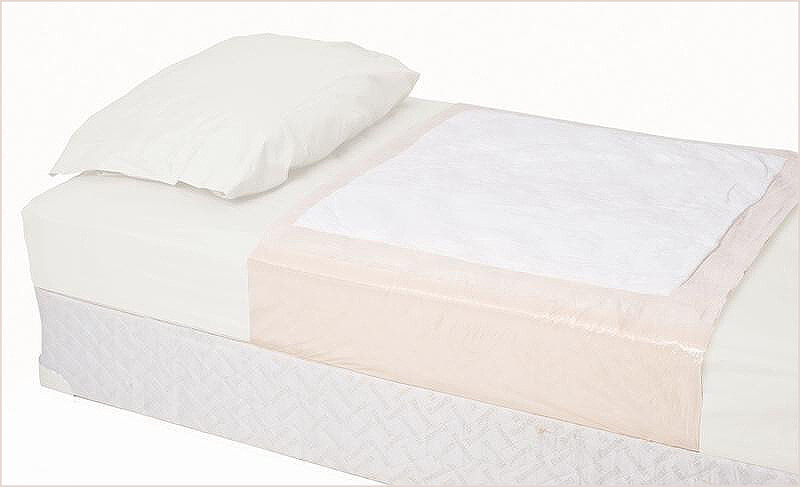 Disposable underpads with flaps to tuck under bed