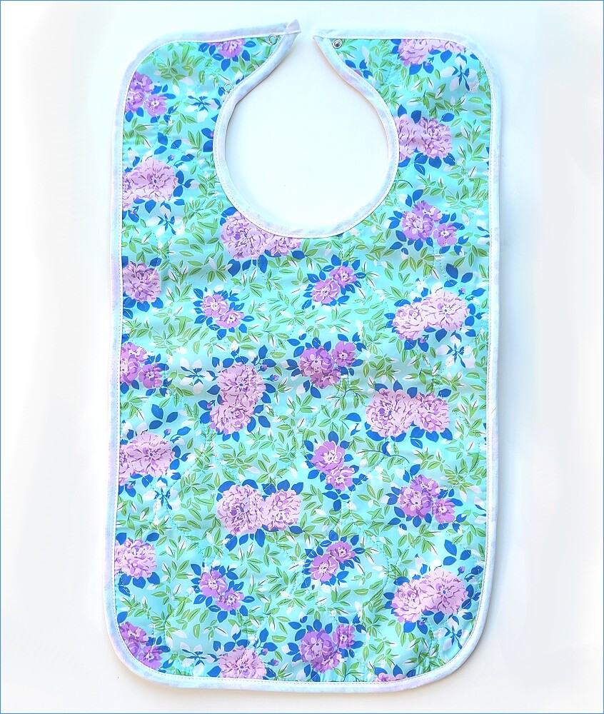 floral bibs and clothing protectors for adults